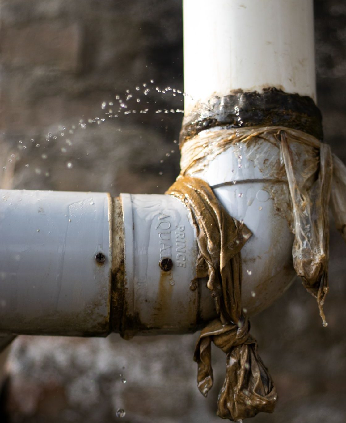 Leaking pipe joint on an emergency plumbing call